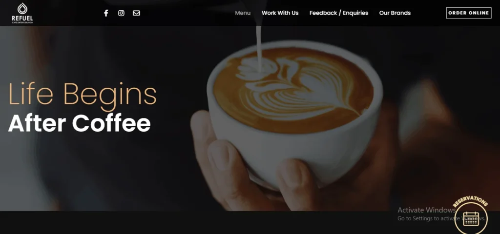 Screenshot of the Refuel Cafe homepage. The top navigation bar displays the "Refuel Cafe.Eatery.Brunch" logo on the left, social media icons, and menu tabs including "Menu," "Work With Us," "Feedback / Enquiries," "Our Brands," and an "Order Online" button. The main banner image features a person holding a white cup of coffee with detailed latte art, overlaid with the text "Life Begins After Coffee." A circular "Reservations" calendar icon is visible in the bottom right corner.