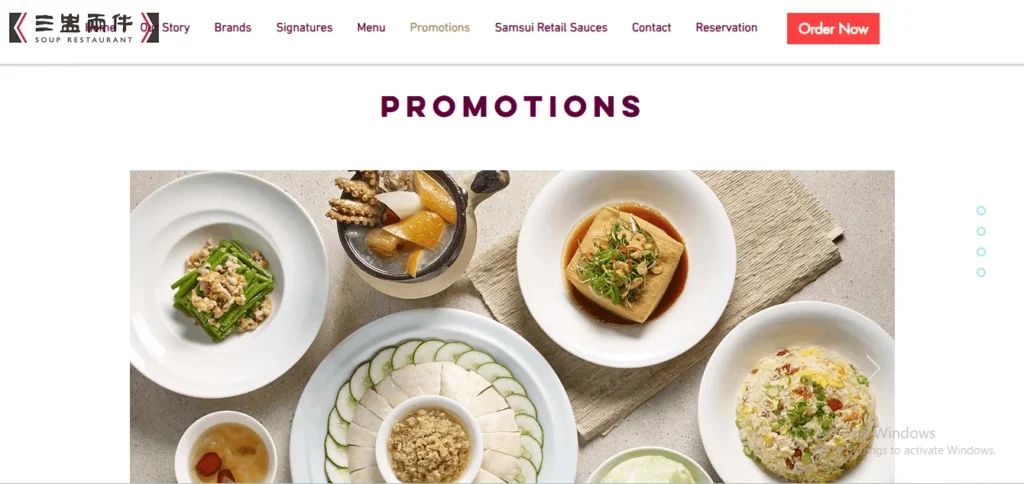 A website screenshot of the "Promotions" page for Soup Restaurant. The top navigation bar features the brand's logo in Chinese and English, links to sections like "Our Story," "Brands," and "Signatures," and a bright red "Order Now" button. Below the header, a large rectangular banner shows a top-down view of several Chinese dishes arranged on a grey tabletop, including Samsui ginger chicken surrounded by cucumber slices, a plate of fried rice, a block of braised tofu topped with greens, a stir-fried green bean dish, and a clay pot soup. A faint "Activate Windows" watermark is visible in the bottom right corner.