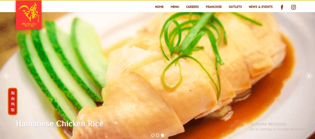 A screenshot of the Wee Nam Kee Hainanese Chicken Rice website featuring a close-up image of sliced poached chicken with cucumber and green onion garnish on a plate, with navigation links (Home, Menu, Careers, Franchise, Outlets, News & Events) and social icons at the top.