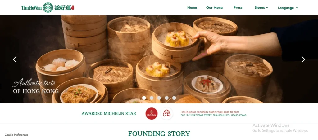 Tim Ho Wan website homepage banner featuring stacks of steaming bamboo dim sum baskets, with a hand holding a basket of siu mai, overlaid with the text "Authentic taste of HONG KONG" and Michelin Star recognition details below.