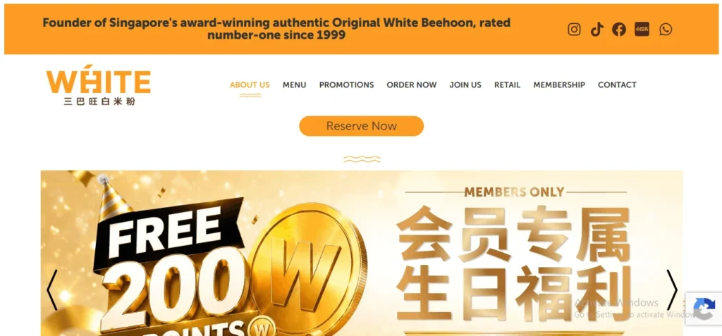 Screenshot of the White Restaurant website homepage featuring the orange "WHITE" logo, navigation menu, a "Reserve Now" button, and a promotional banner offering free 200 points for members.
