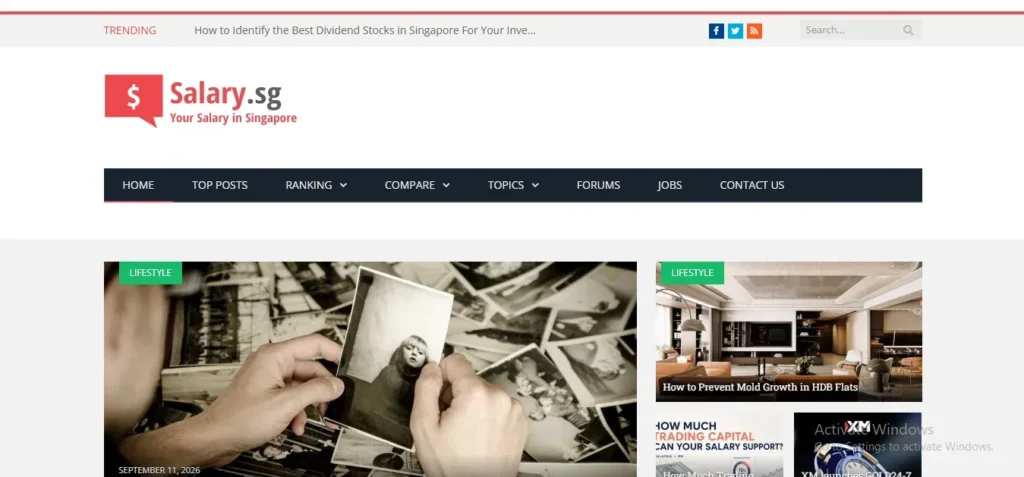 Screenshot of the Salary.sg website homepage featuring the red brand logo, top navigation menu, trending bar, and lifestyle blog posts including an article on preventing mold growth in HDB flats.